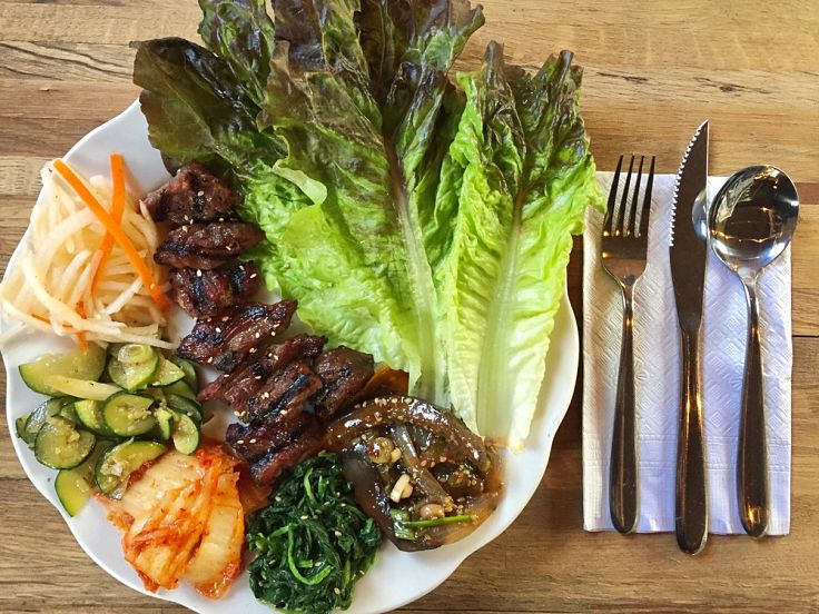 Korean meat dishes served with a variety of fresh vegetables and greens is a very healthy choice